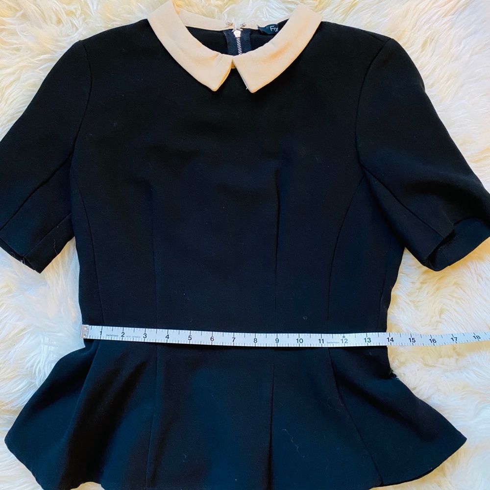Peplum Peter Pan top